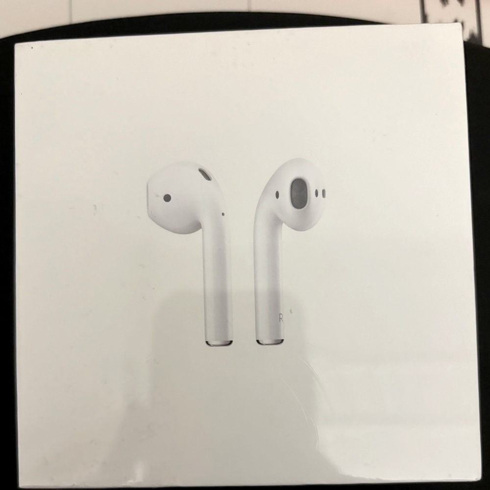 Apple AirPods 2nd generation with Charging Case never opened in plastic.